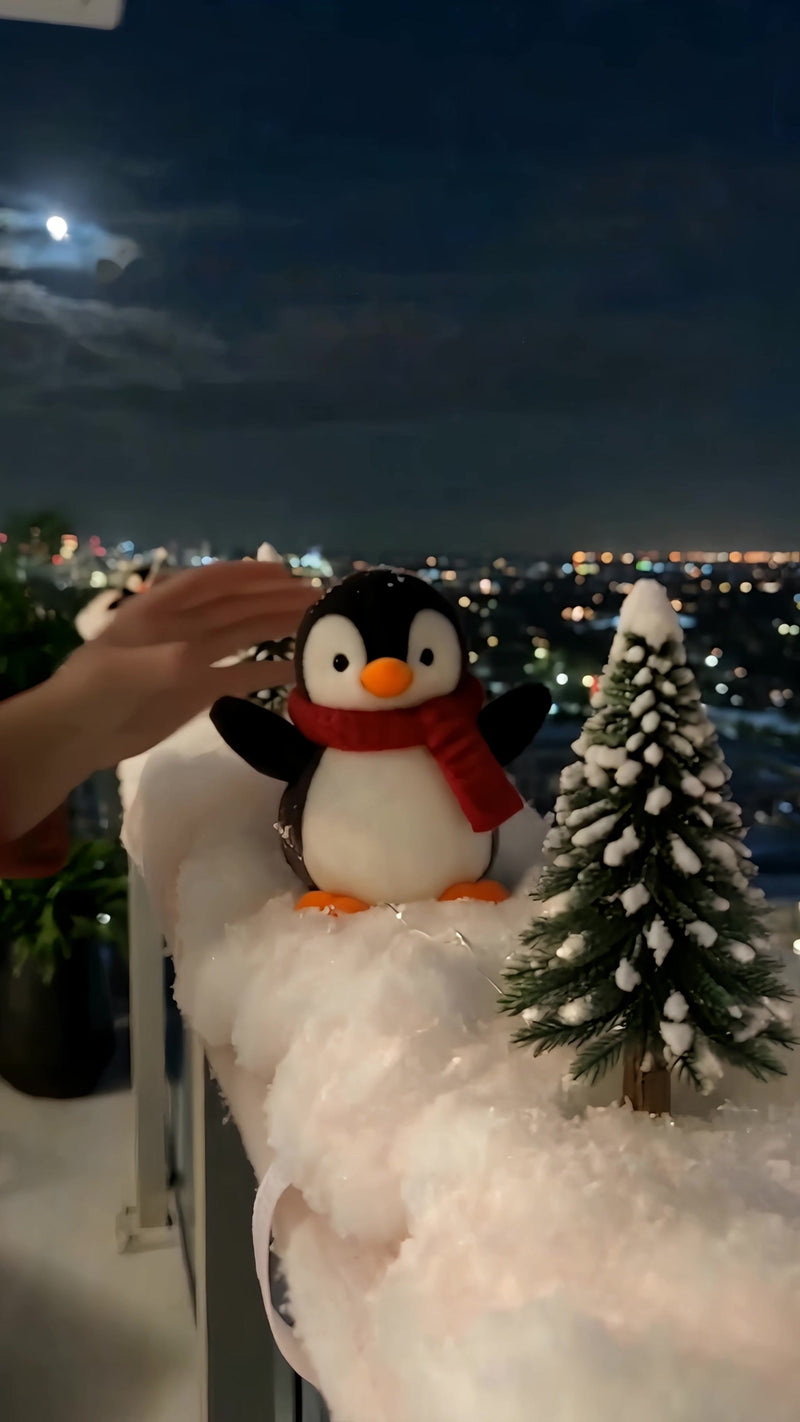 Penguin and mini snowy tree on the garland